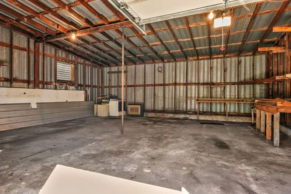 a view of a room with wooden walls