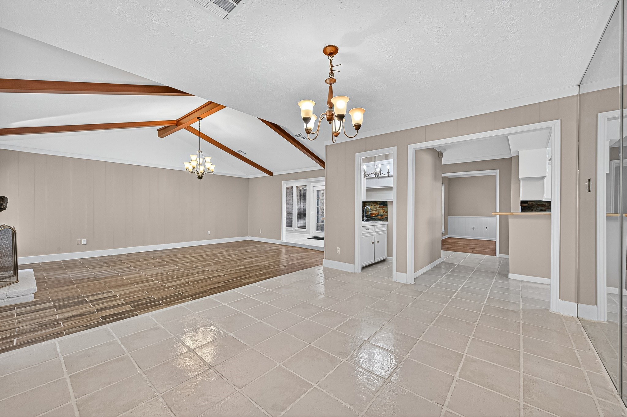 13903 Chevy Chase Drive Houston, TX 77077 - Photo 16 of 48 a view of livingroom with hardwood floor and ceiling fan