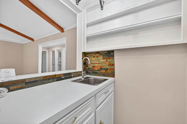 a bathroom with a sink and a bathtub
