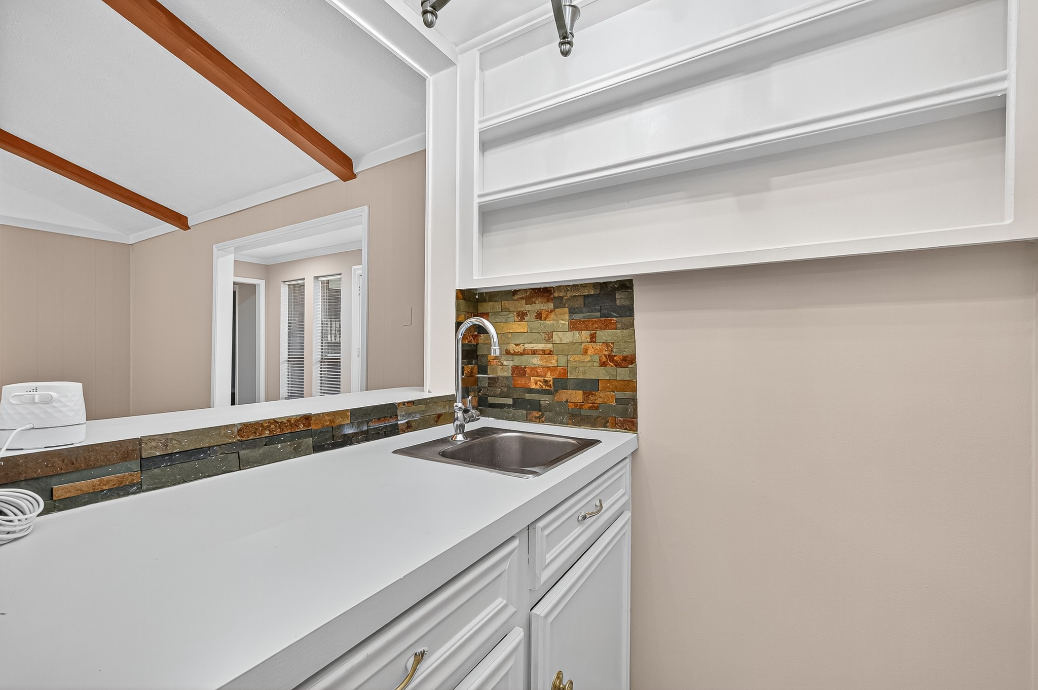 13903 Chevy Chase Drive Houston, TX 77077 - Photo 18 of 48 a bathroom with a sink and a bathtub