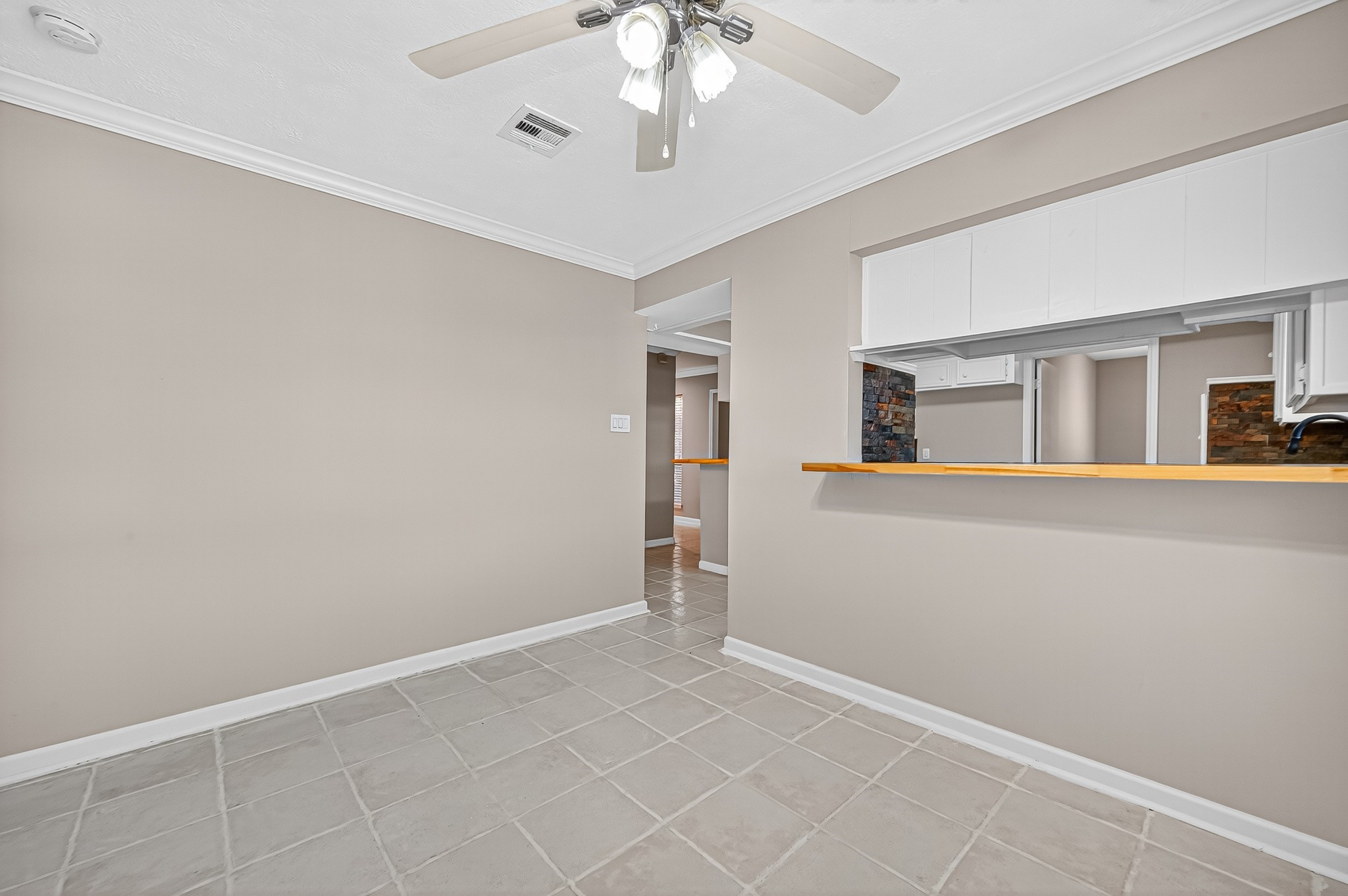 13903 Chevy Chase Drive Houston, TX 77077 - Photo 27 of 48 a view of an empty room with a window