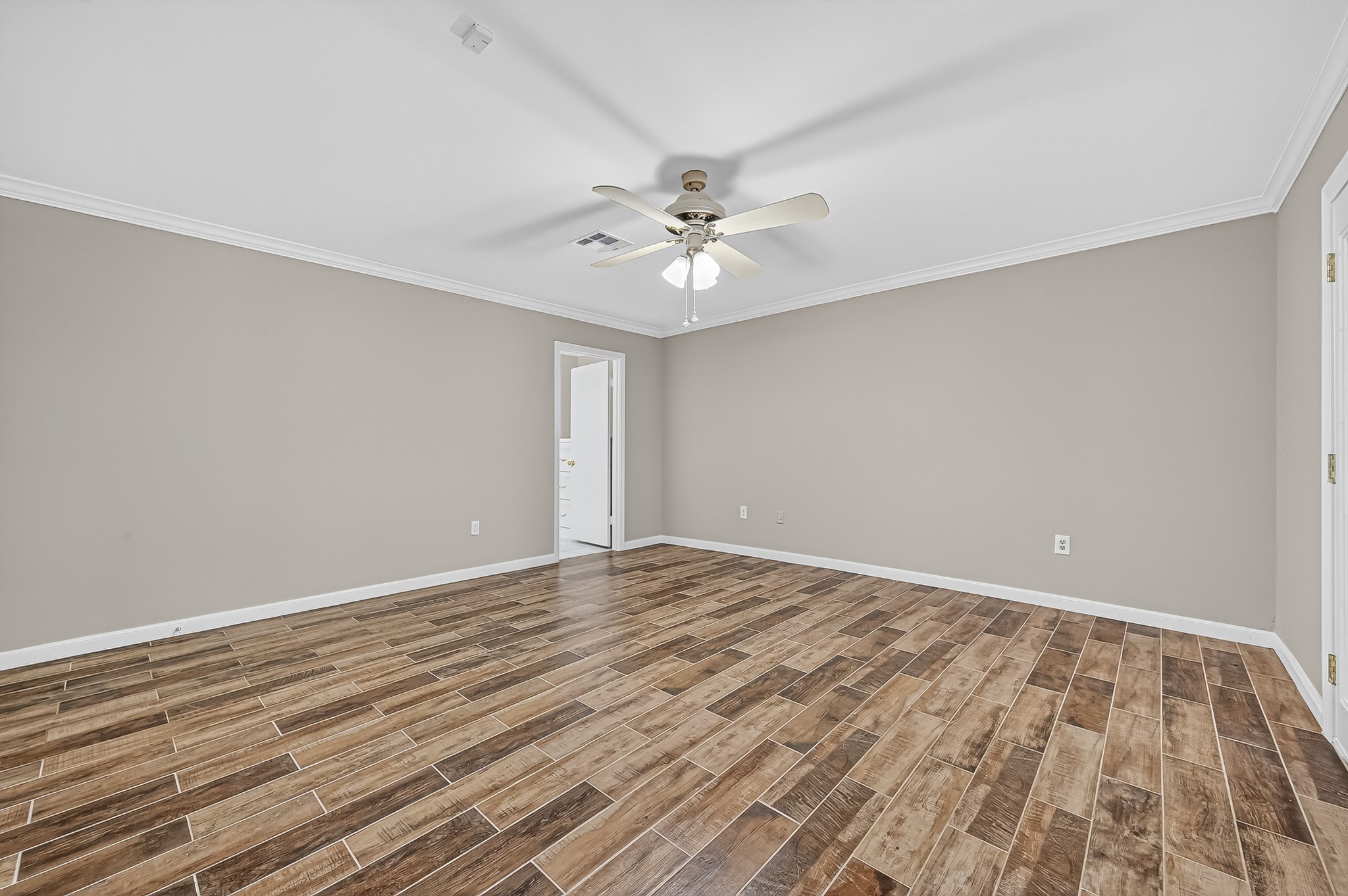 13903 Chevy Chase Drive Houston, TX 77077 - Photo 30 of 48 wooden floor in an empty room