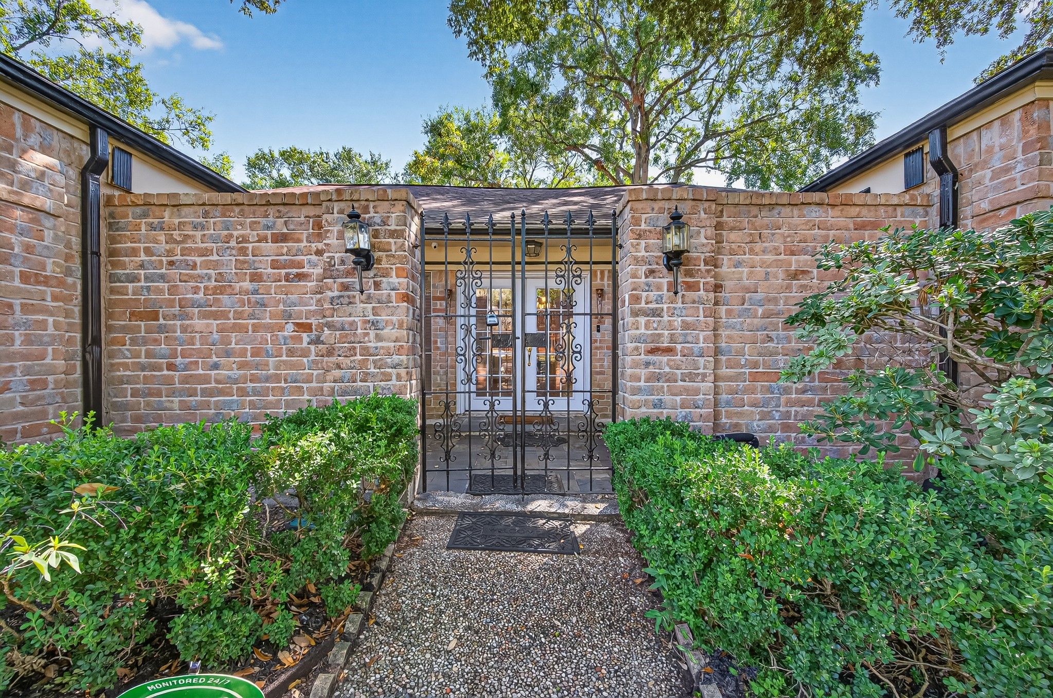 13903 Chevy Chase Drive Houston, TX 77077 - Photo 3 of 48 a view of a pathway both side of house