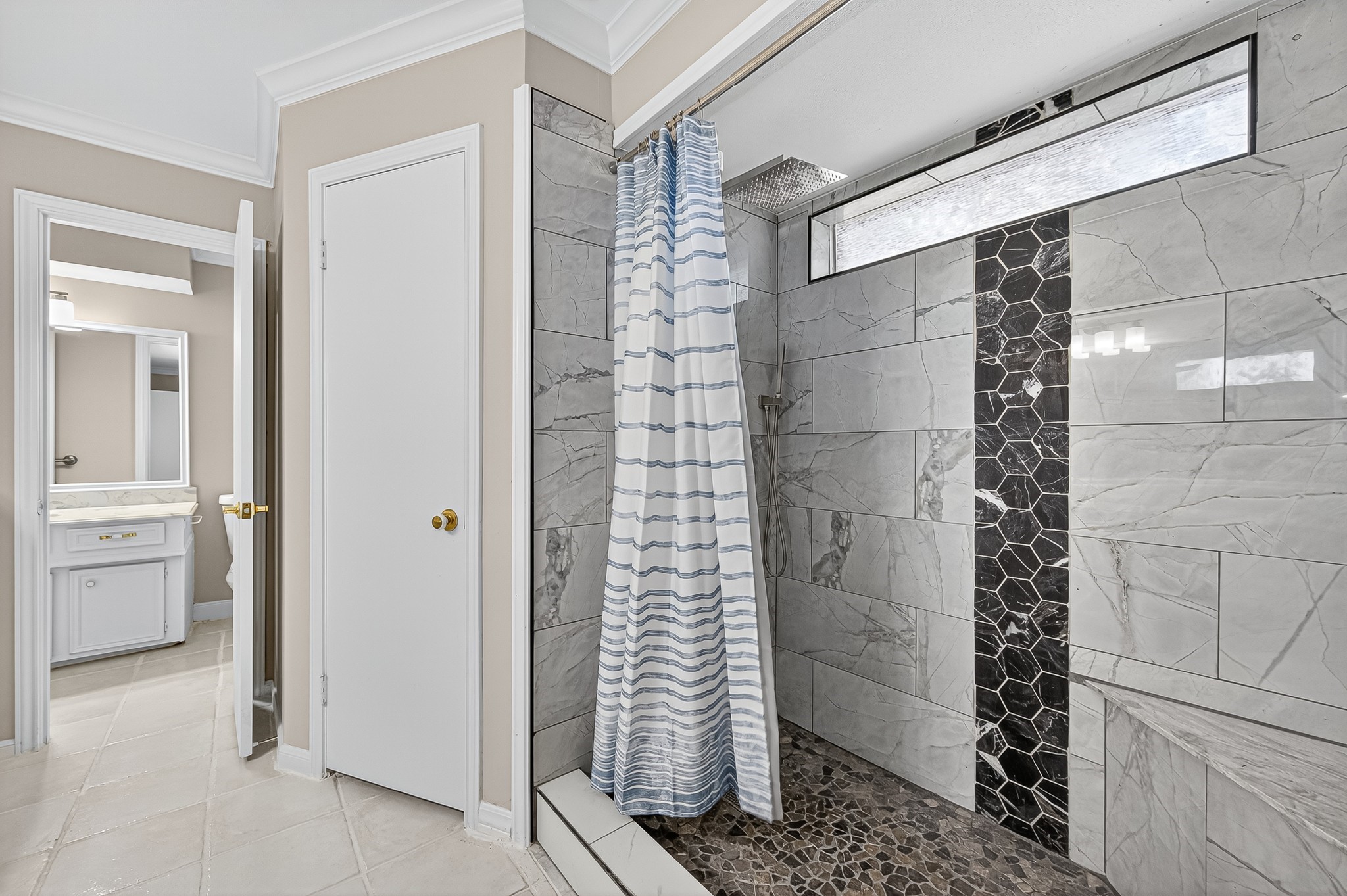 13903 Chevy Chase Drive Houston, TX 77077 - Photo 33 of 48 a bathroom with a shower