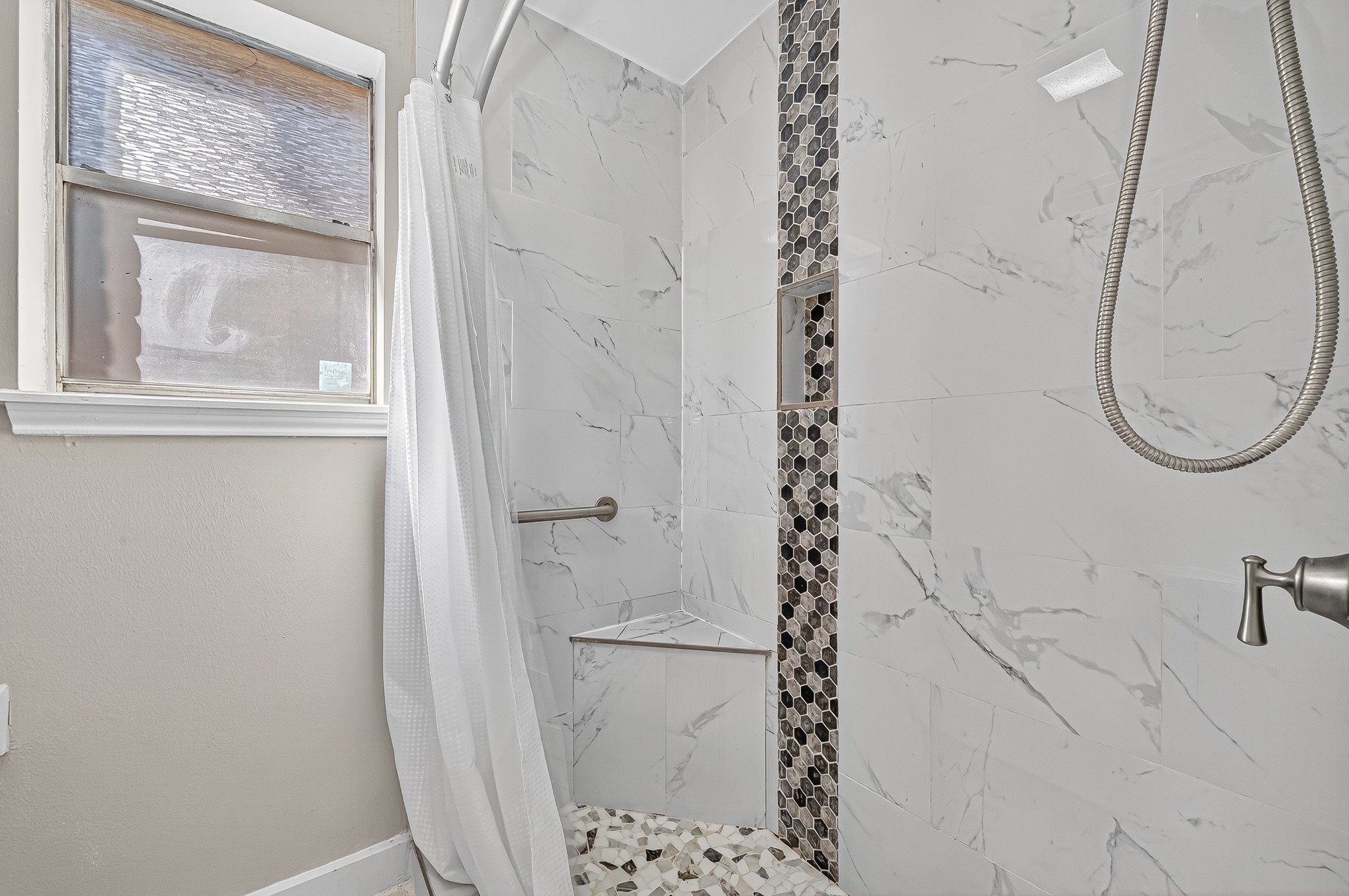 13903 Chevy Chase Drive Houston, TX 77077 - Photo 37 of 48 a bathroom with a shower