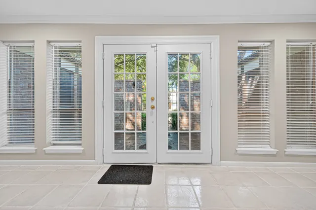 a view of a room with a large window