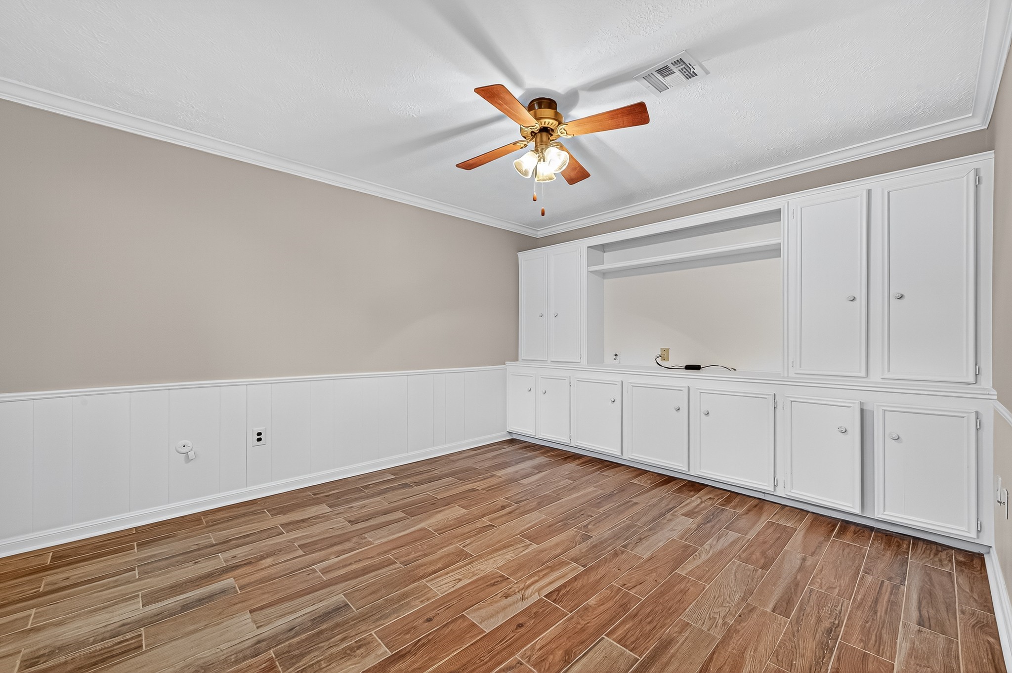 13903 Chevy Chase Drive Houston, TX 77077 - Photo 6 of 48 wooden floor in an empty room