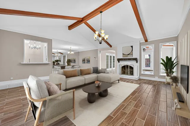 a living room with furniture or couch and a fireplace