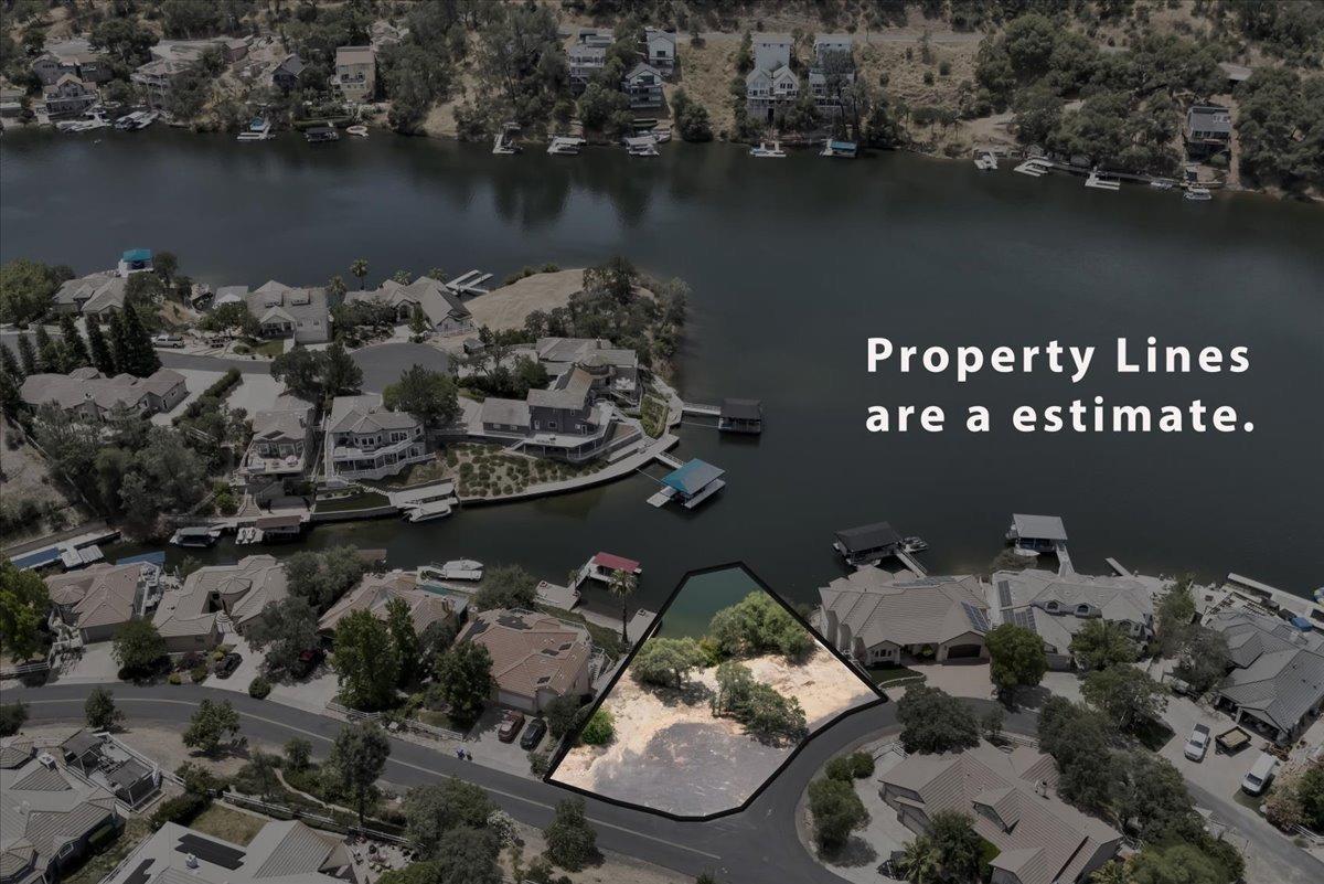 6256 Ricky Road Copperopolis, CA 95228 - Photo 2 of 10 an aerial view of a house with a lake view