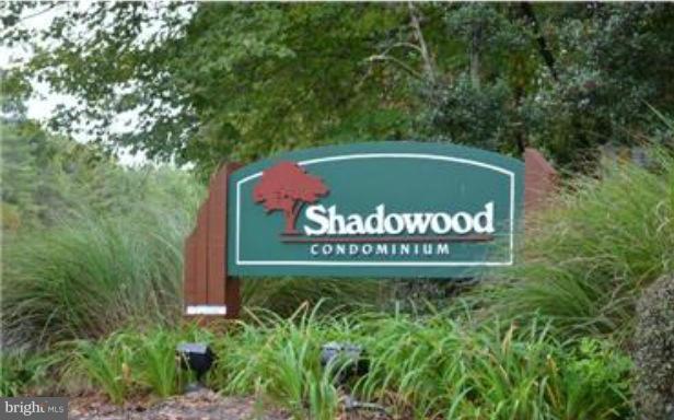 11607 Stoneview Square, Unit 2B Reston, VA 20191 - Photo 18 of 20 a sign on the side of a road