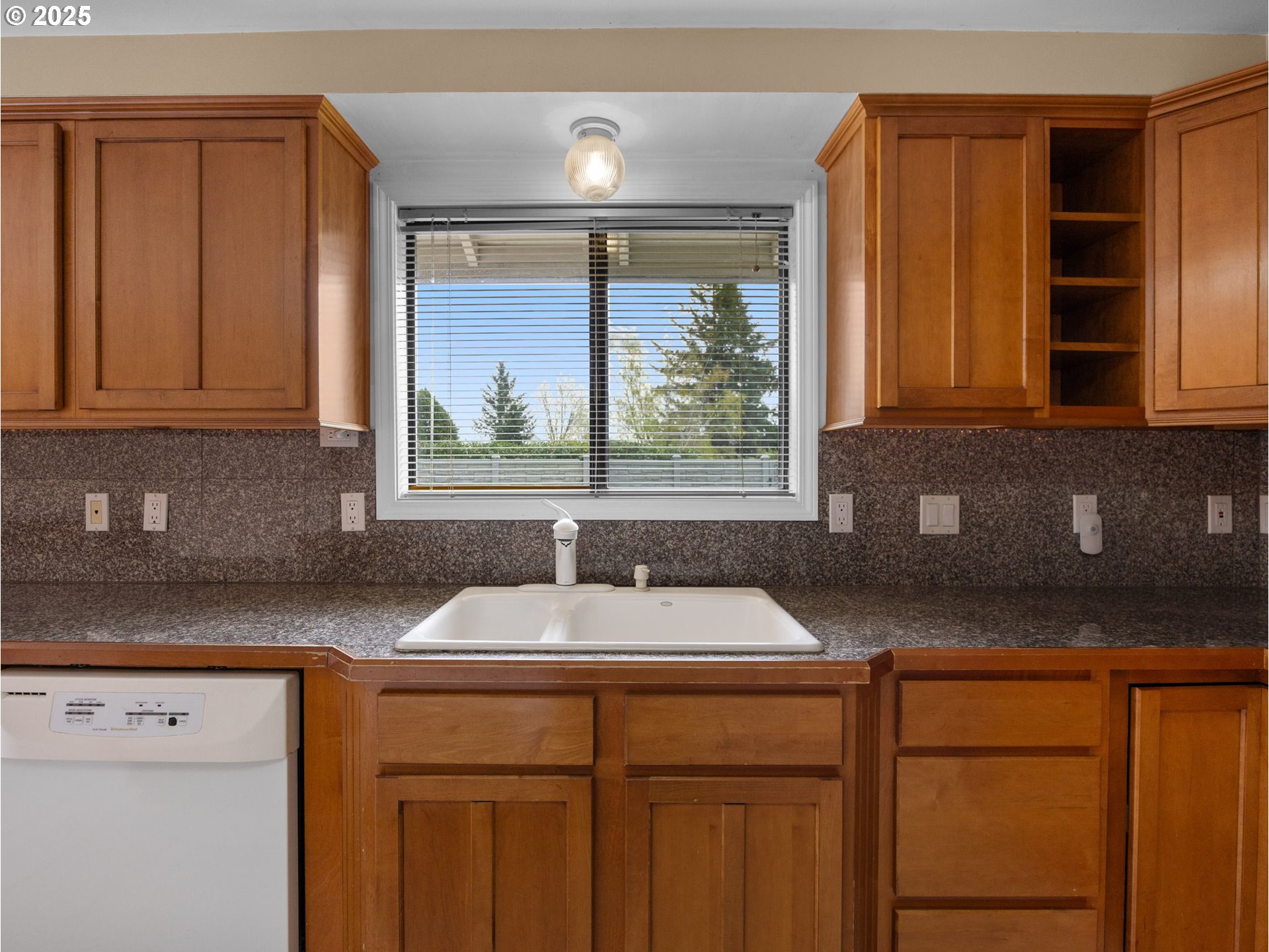 462 Northeast 24th Street Gresham, OR 97030 - Photo 11 of 37 a kitchen with a sink cabinets and window