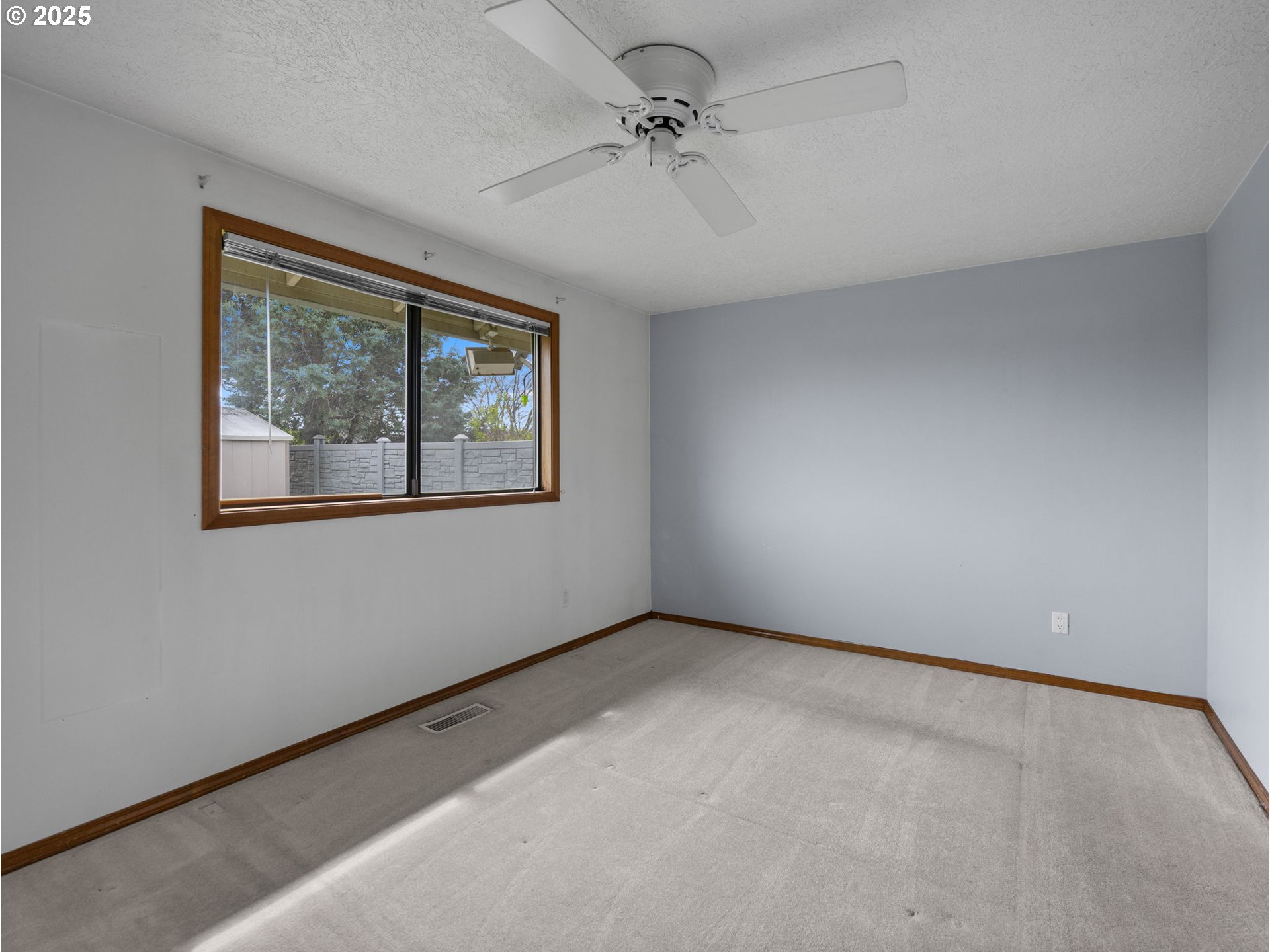 462 Northeast 24th Street Gresham, OR 97030 - Photo 17 of 37 an empty room with a window