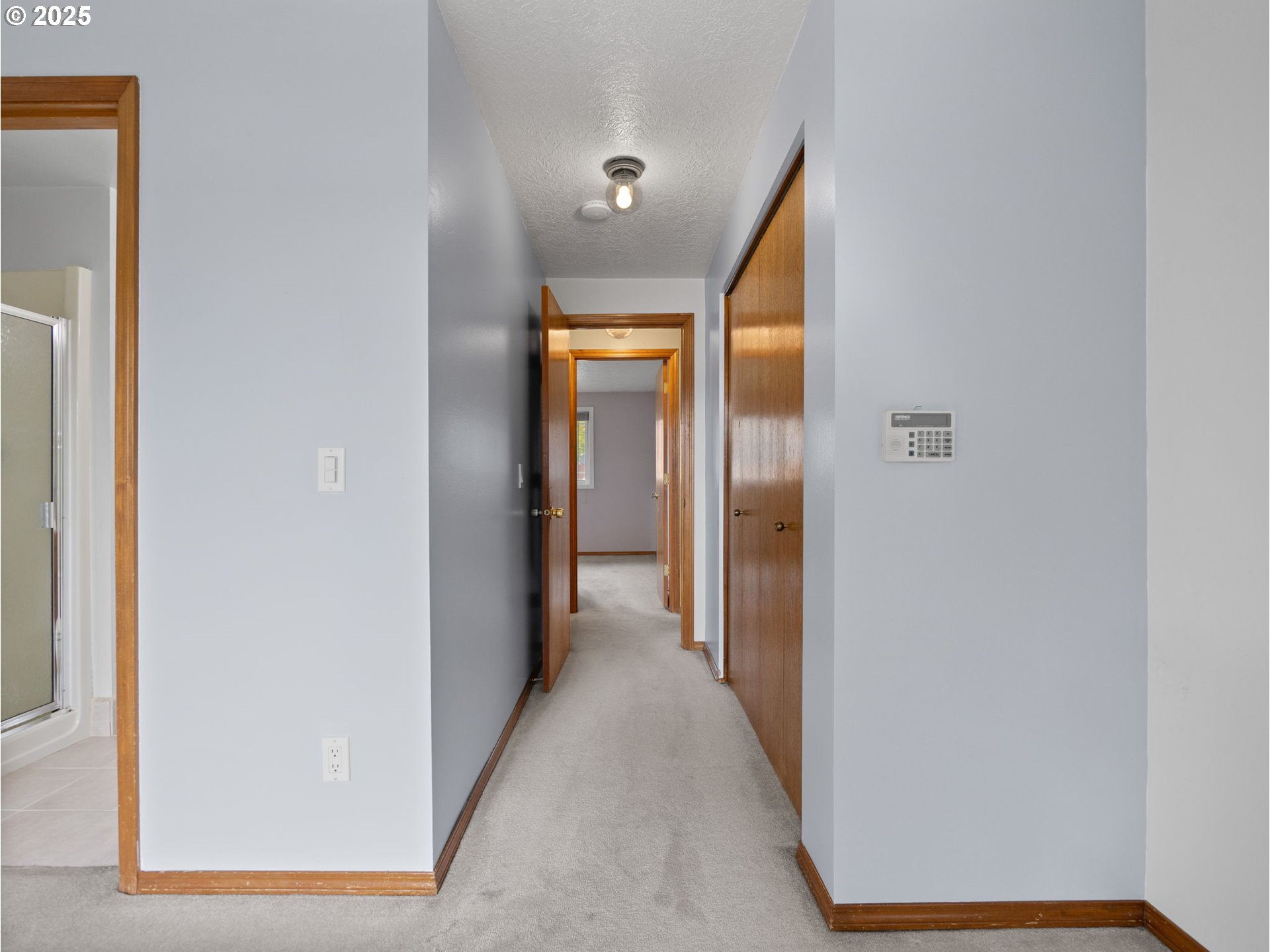 462 Northeast 24th Street Gresham, OR 97030 - Photo 21 of 37 a view of a hallway with wooden floor and closet