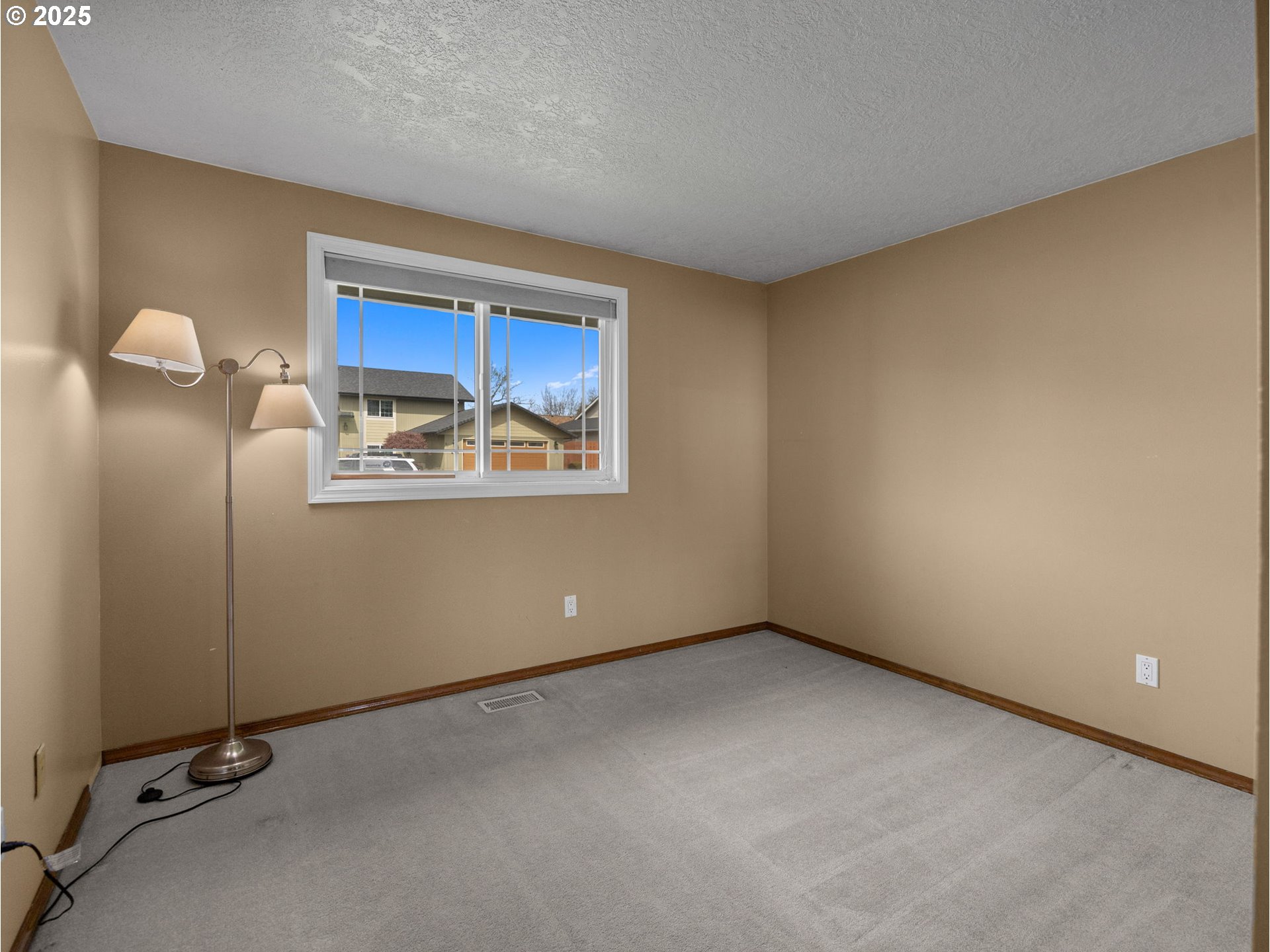 462 Northeast 24th Street Gresham, OR 97030 - Photo 22 of 37 a view of an empty room with a window