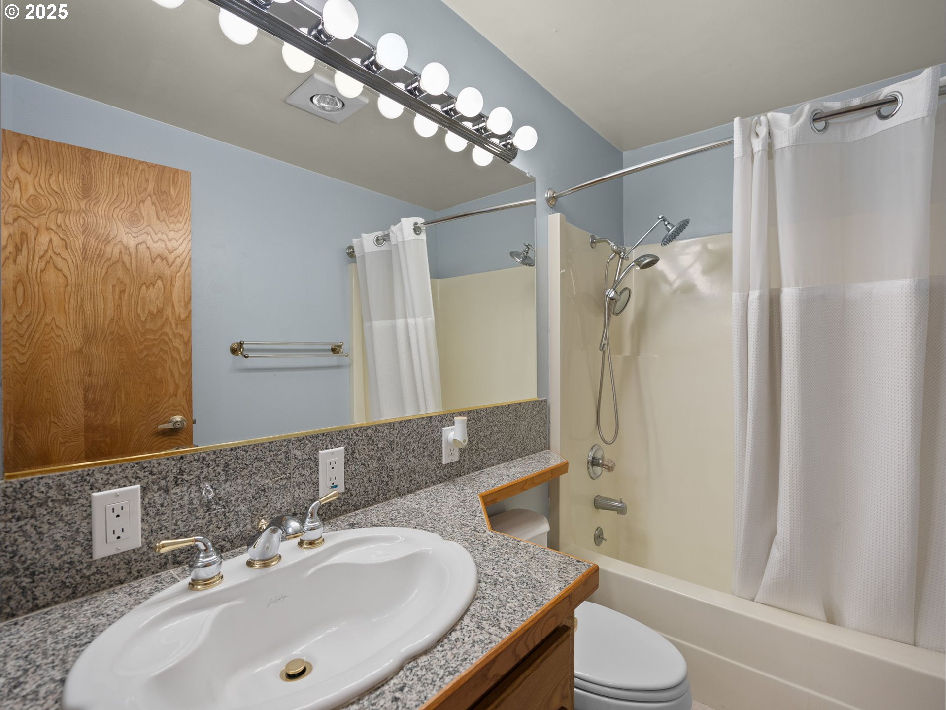 462 Northeast 24th Street Gresham, OR 97030 - Photo 24 of 37 a bathroom with a sink toilet double vanity and shower
