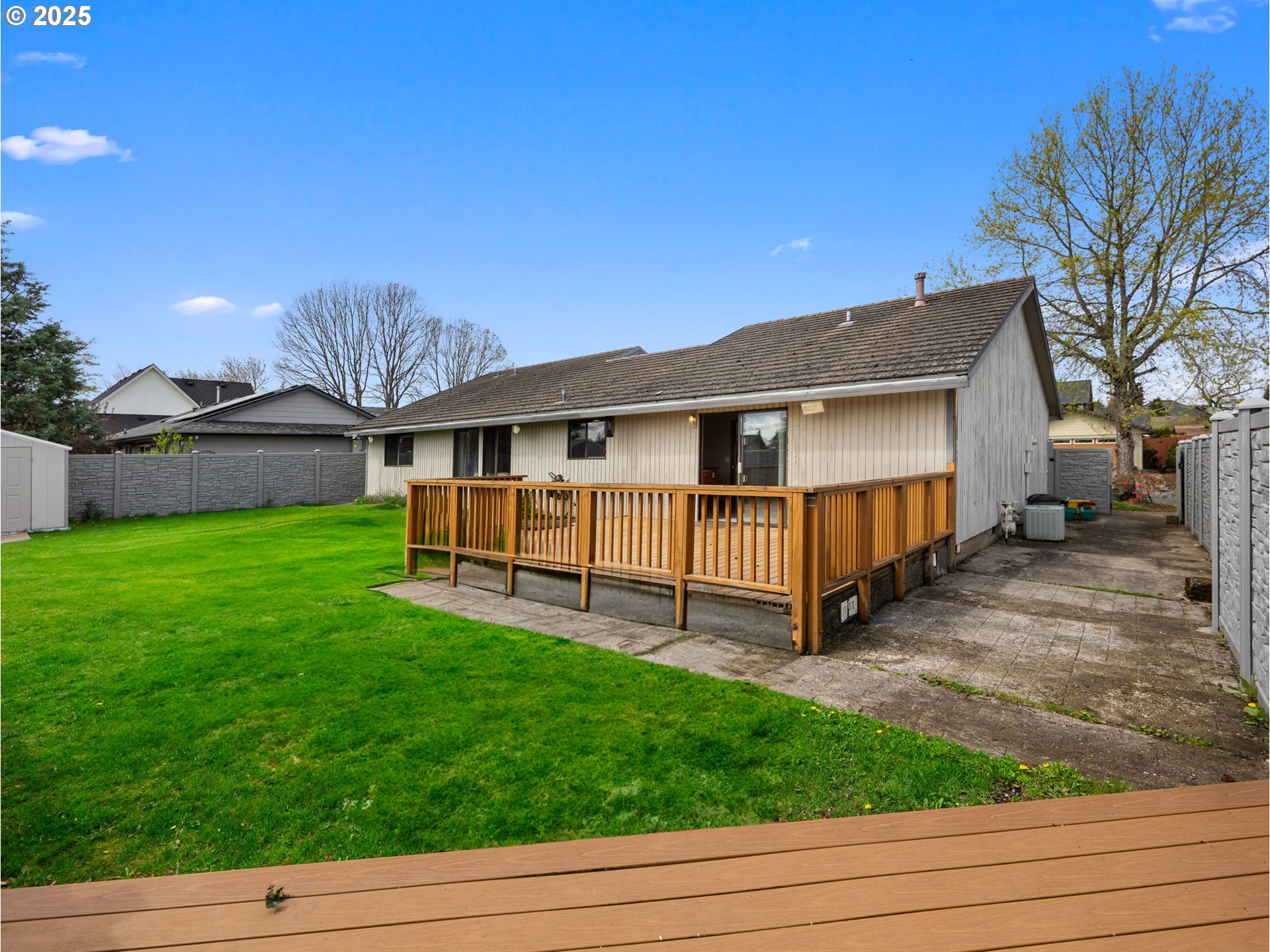 462 Northeast 24th Street Gresham, OR 97030 - Photo 36 of 37 a view of a house with a yard and deck