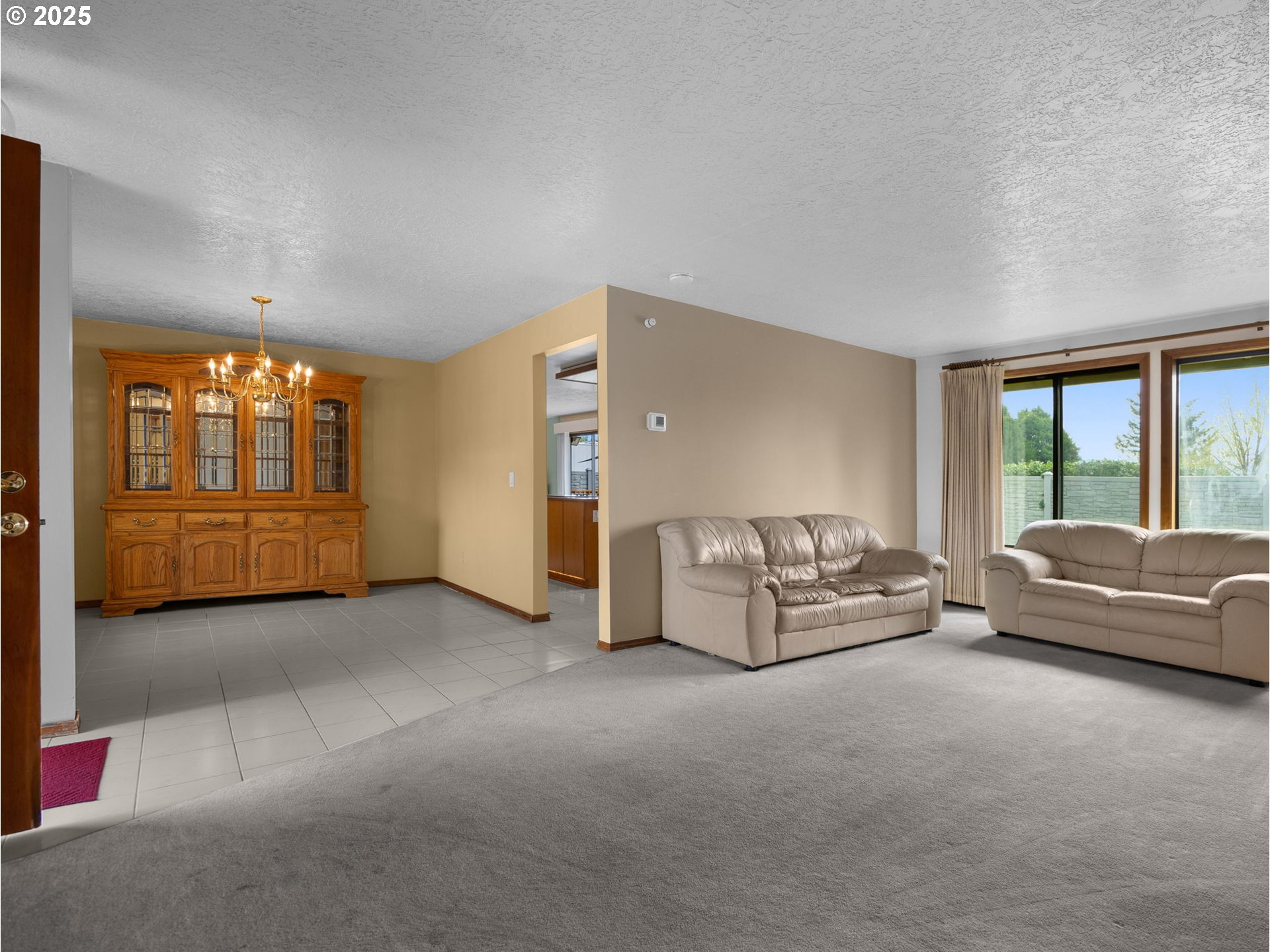 462 Northeast 24th Street Gresham, OR 97030 - Photo 6 of 37 a living room with furniture and a large window