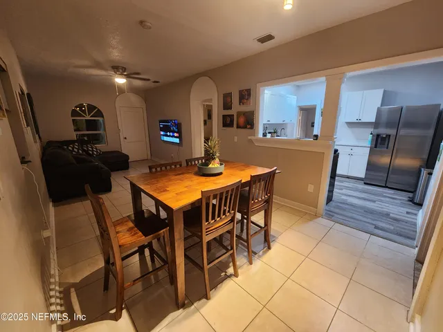 a view of a dining room with furniture
