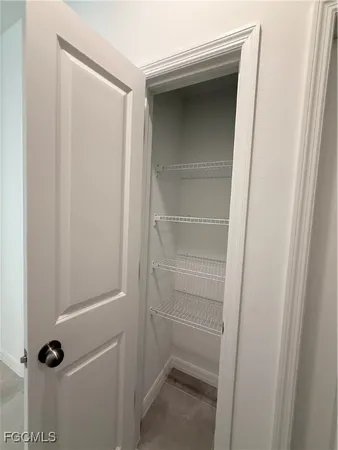 a bathroom with a granite countertop sink a toilet and bathtub