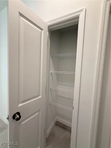 a bathroom with a granite countertop sink a toilet and bathtub