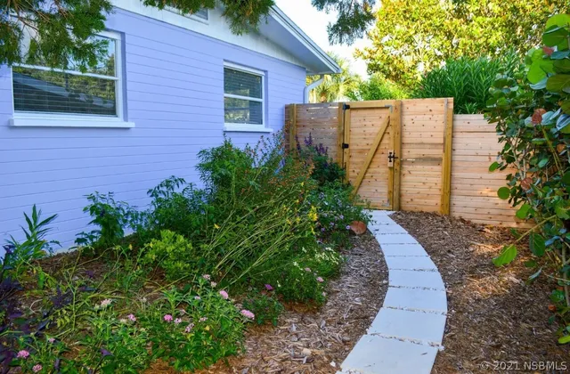 a view of a pathway in a garden