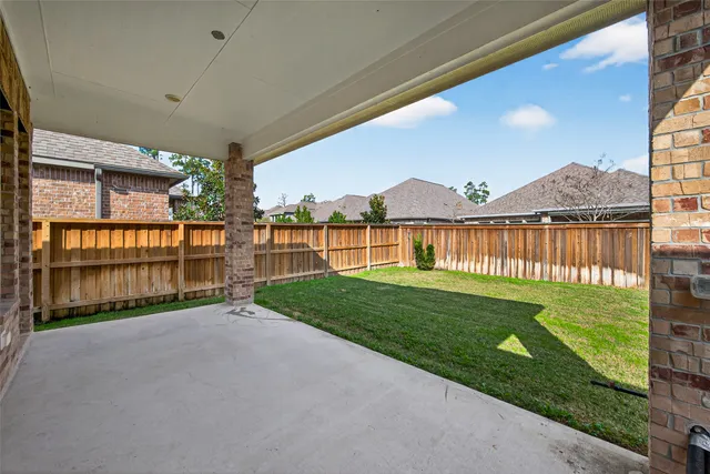 a view of a yard with an outdoor space