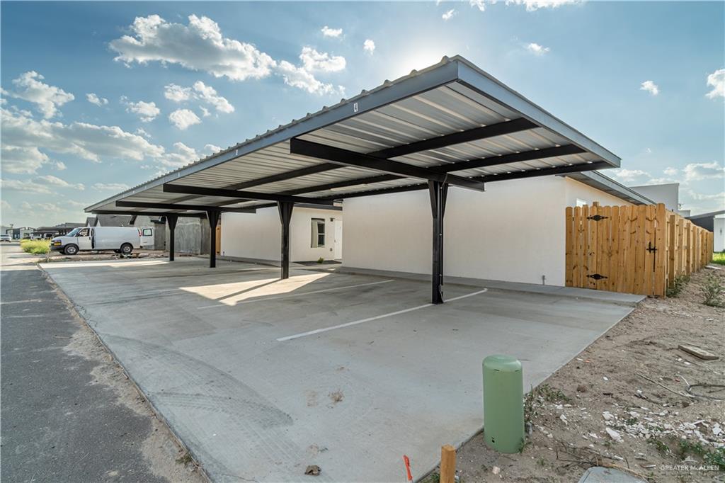 11500 North 25th Lane, Unit 2 McAllen, TX 78504 - Photo 16 of 19 a swimming pool with a outdoor seating and yard