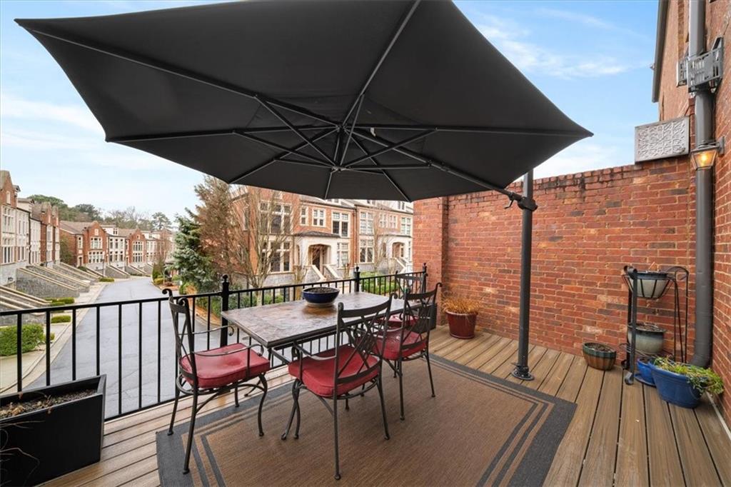 2916 Hermance Drive Northeast Atlanta, GA 30319 - Photo 15 of 38 an outdoor space with furniture and umbrella