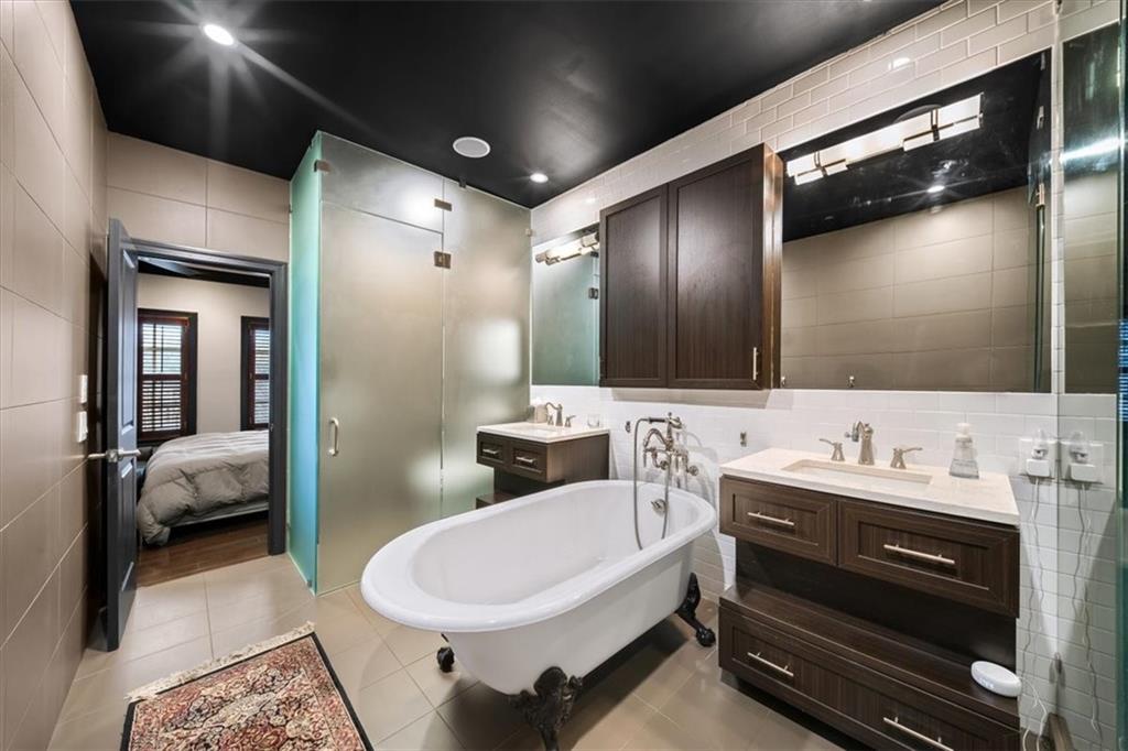 2916 Hermance Drive Northeast Atlanta, GA 30319 - Photo 22 of 38 a en suite spacious bathroom with a double vanity sink and a mirror