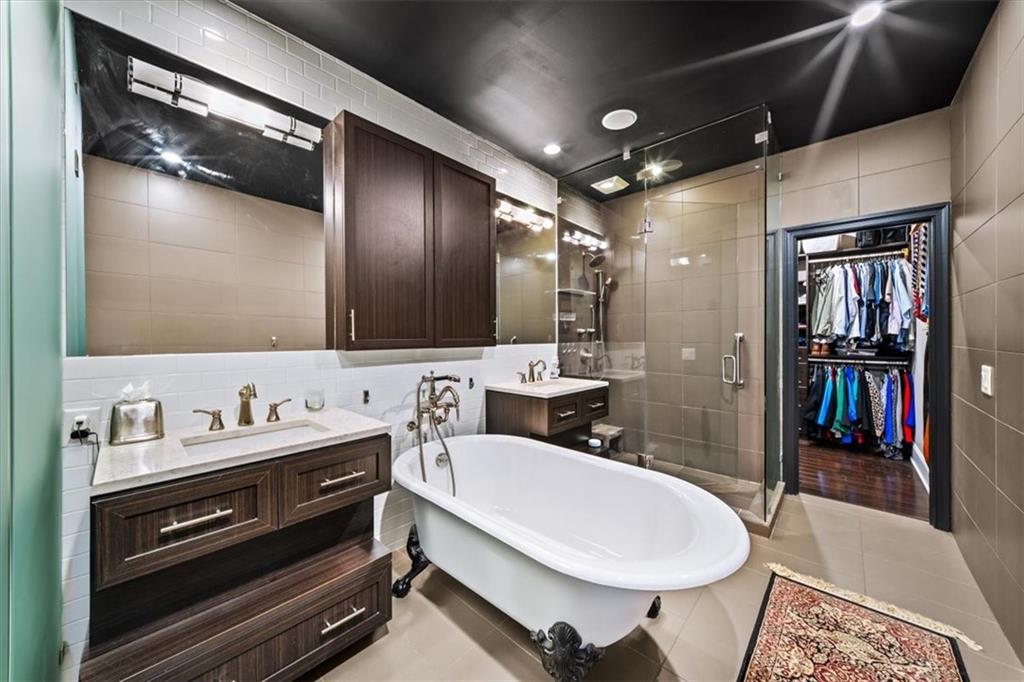 2916 Hermance Drive Northeast Atlanta, GA 30319 - Photo 23 of 38 a bathroom with a sink a toilet and a mirror