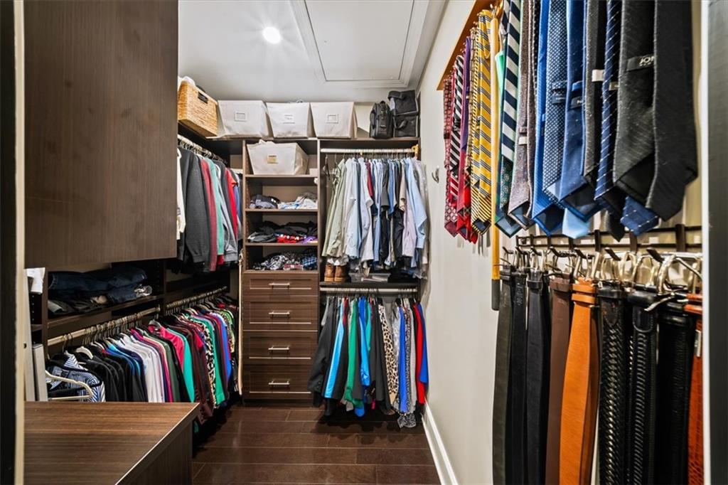 2916 Hermance Drive Northeast Atlanta, GA 30319 - Photo 25 of 38 a view of walk in closet with clothes and shoes