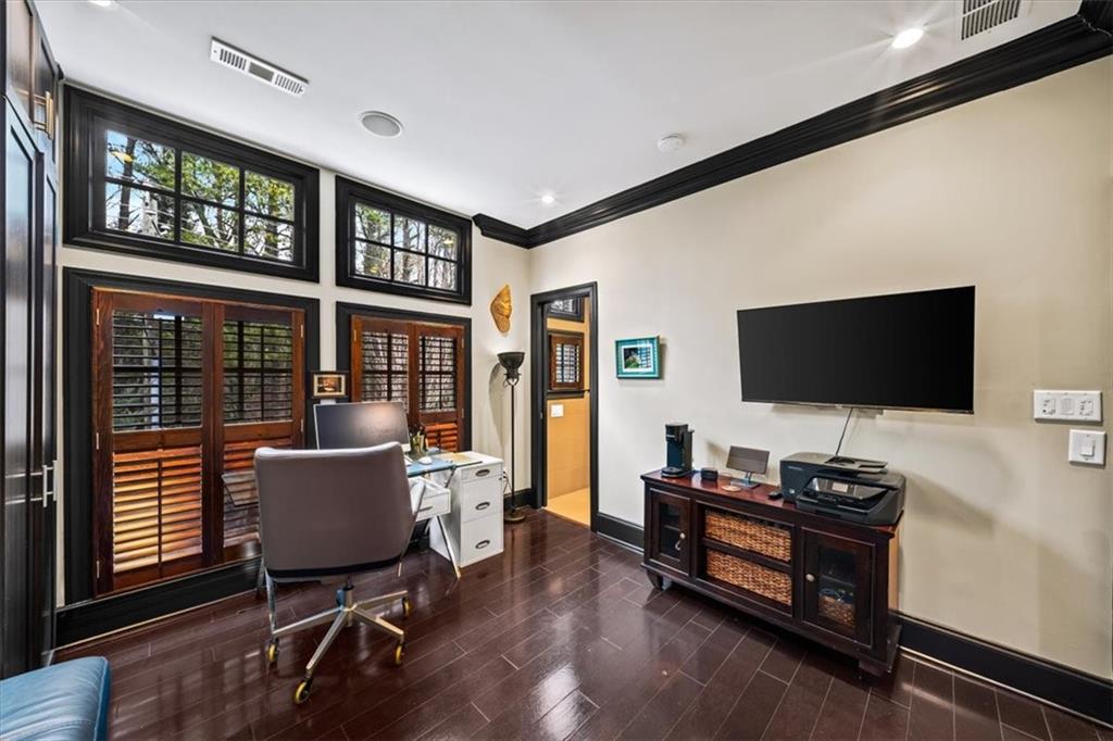 2916 Hermance Drive Northeast Atlanta, GA 30319 - Photo 27 of 38 a living room with furniture and a flat screen tv