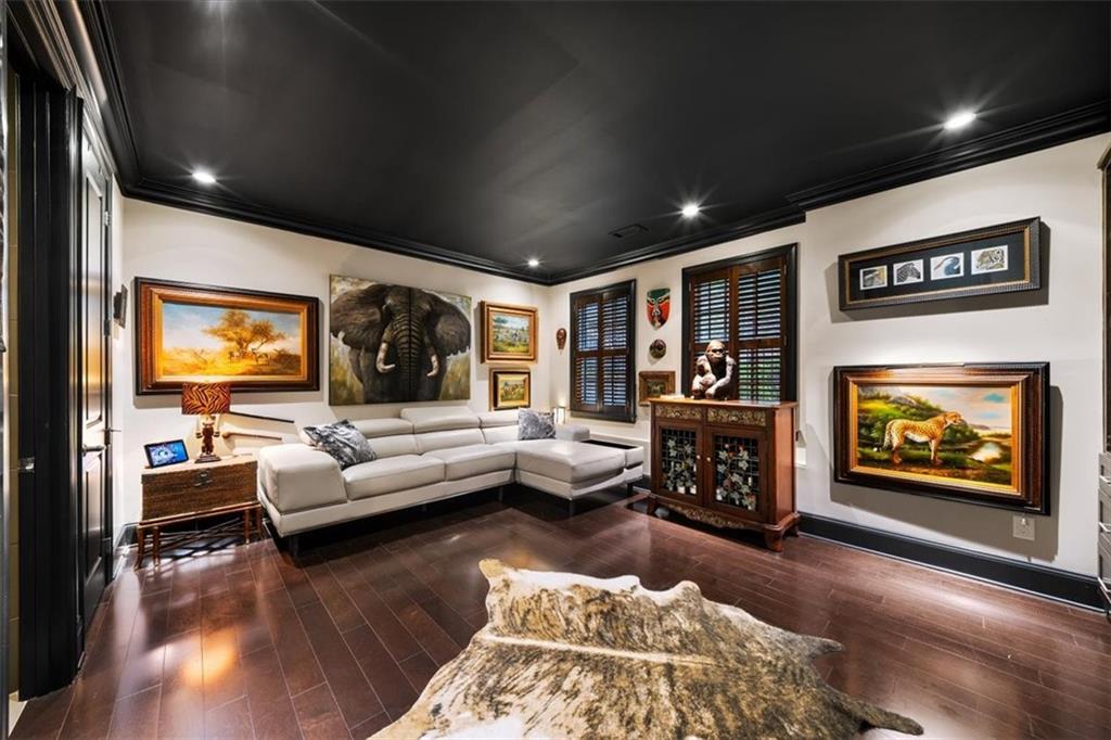 2916 Hermance Drive Northeast Atlanta, GA 30319 - Photo 29 of 38 a living room with fireplace furniture and a flat screen tv