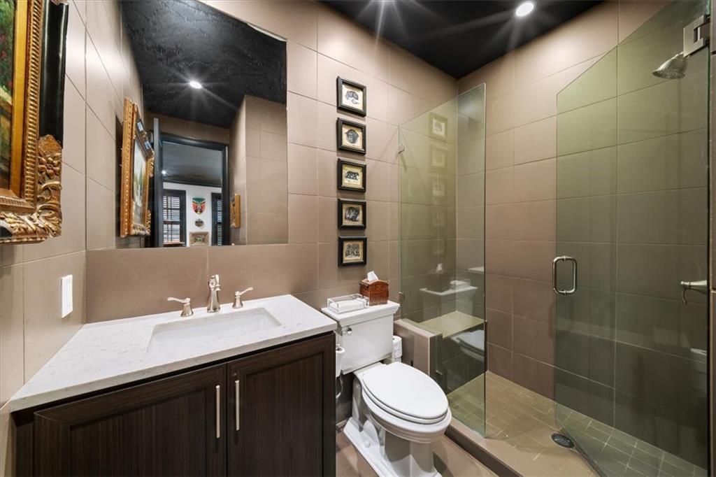 2916 Hermance Drive Northeast Atlanta, GA 30319 - Photo 31 of 38 a bathroom with a sink toilet and shower