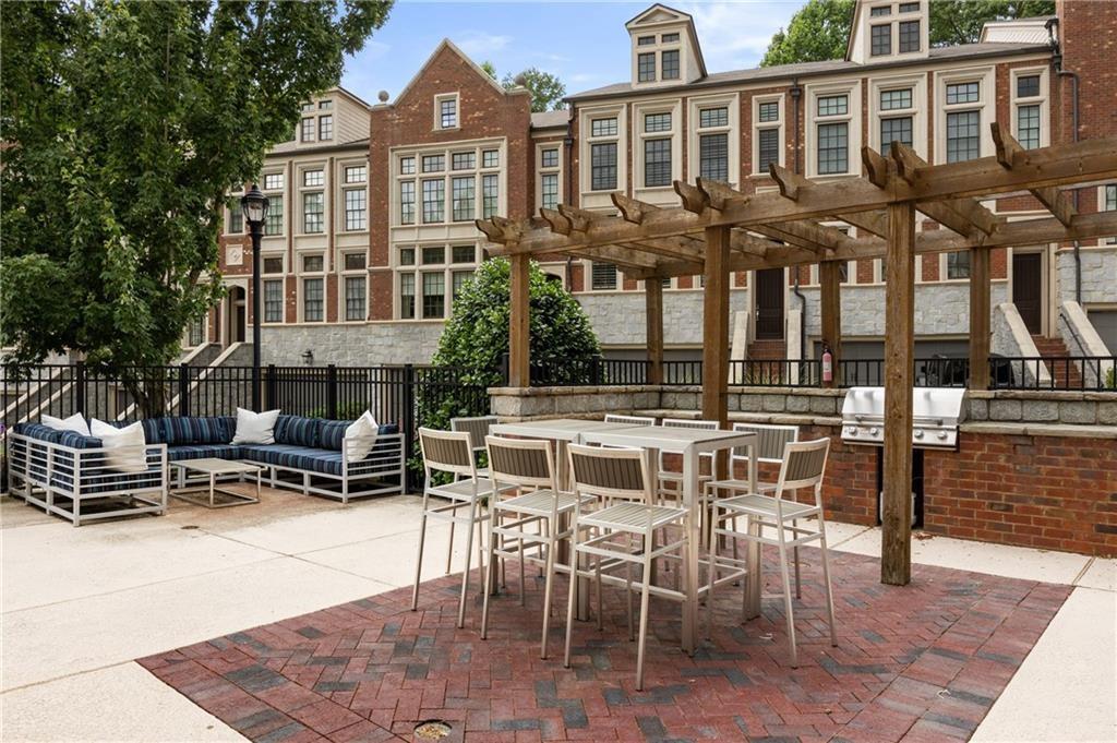 2916 Hermance Drive Northeast Atlanta, GA 30319 - Photo 34 of 38 a view of a cafe with sitting area