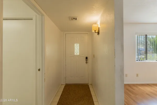 a view of a bathroom from the hallway