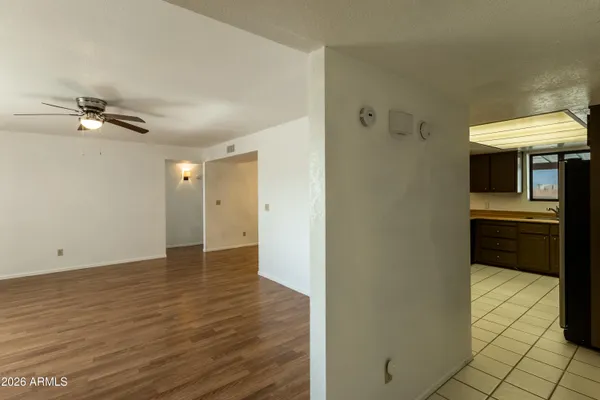 a view of a kitchen cabinets and wooden floor