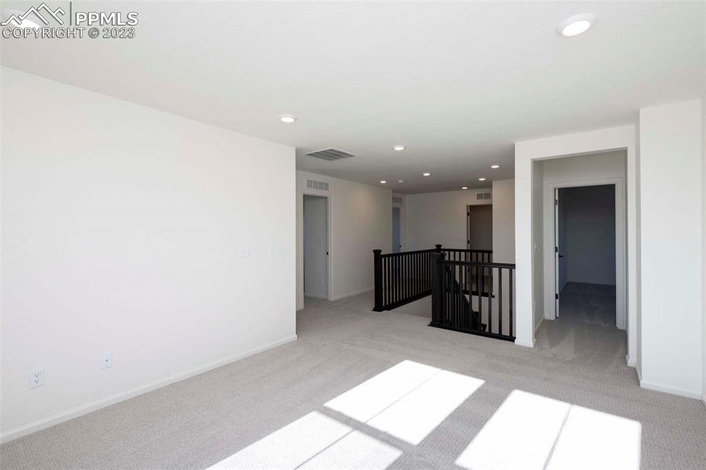 2039 Peachleaf Loop Castle Rock, CO 80108 - Photo 18 of 23 a view of kitchen with refrigerator and a sink