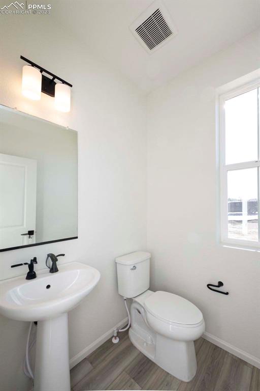 2039 Peachleaf Loop Castle Rock, CO 80108 - Photo 6 of 23 a bathroom with a sink and a toilet