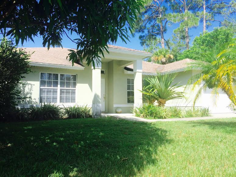 2354 Southwest Neal Road Port St. Lucie, FL 34953 - Photo 1 of 13 front of house