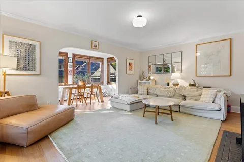 a reading room with furniture and a window