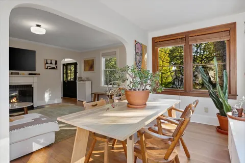 a spacious bathroom with a double vanity sink a mirror and a shower