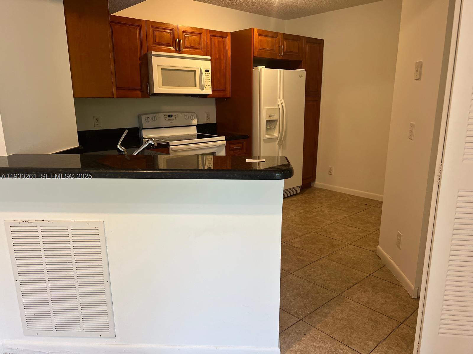 8821 Wiles Road, Unit 306 Coral Springs, FL 33067 - Photo 4 of 23