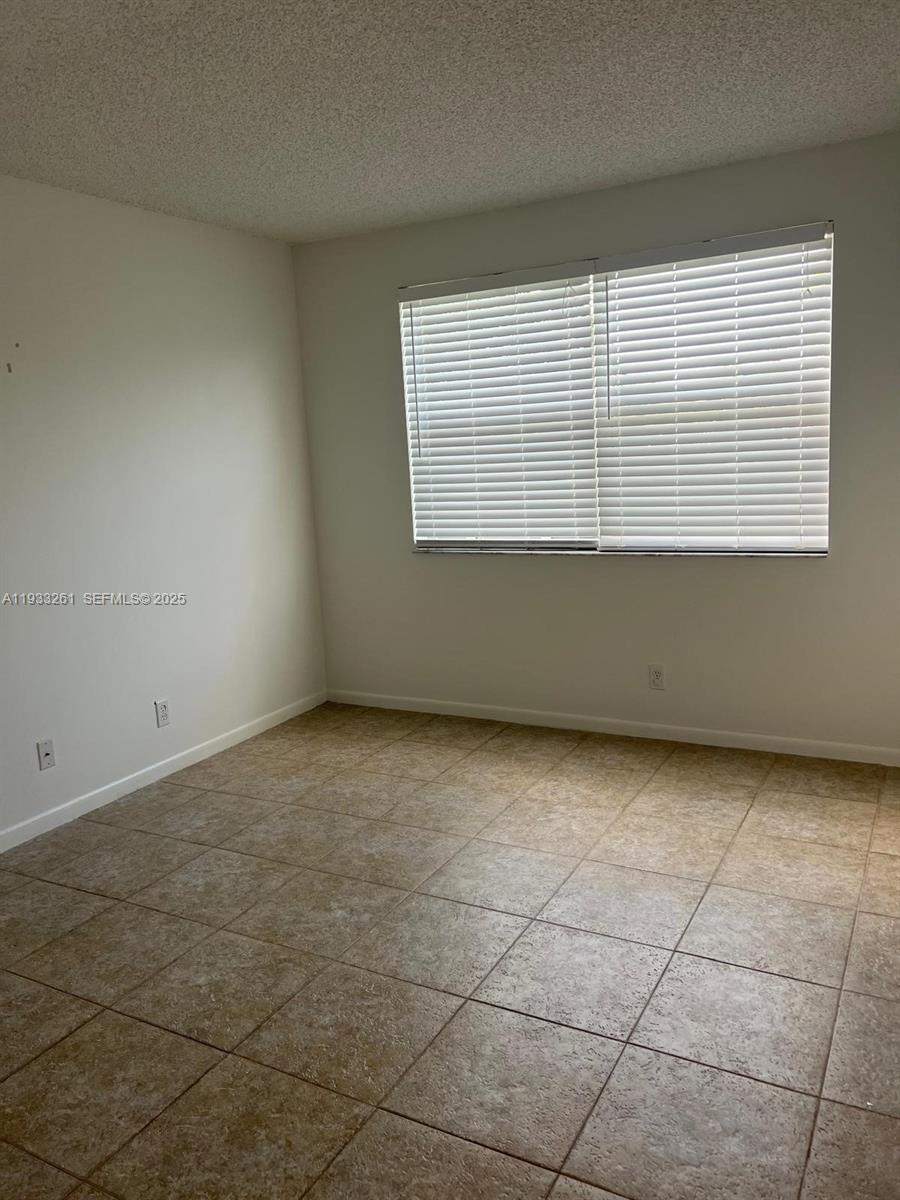 8821 Wiles Road, Unit 306 Coral Springs, FL 33067 - Photo 9 of 23