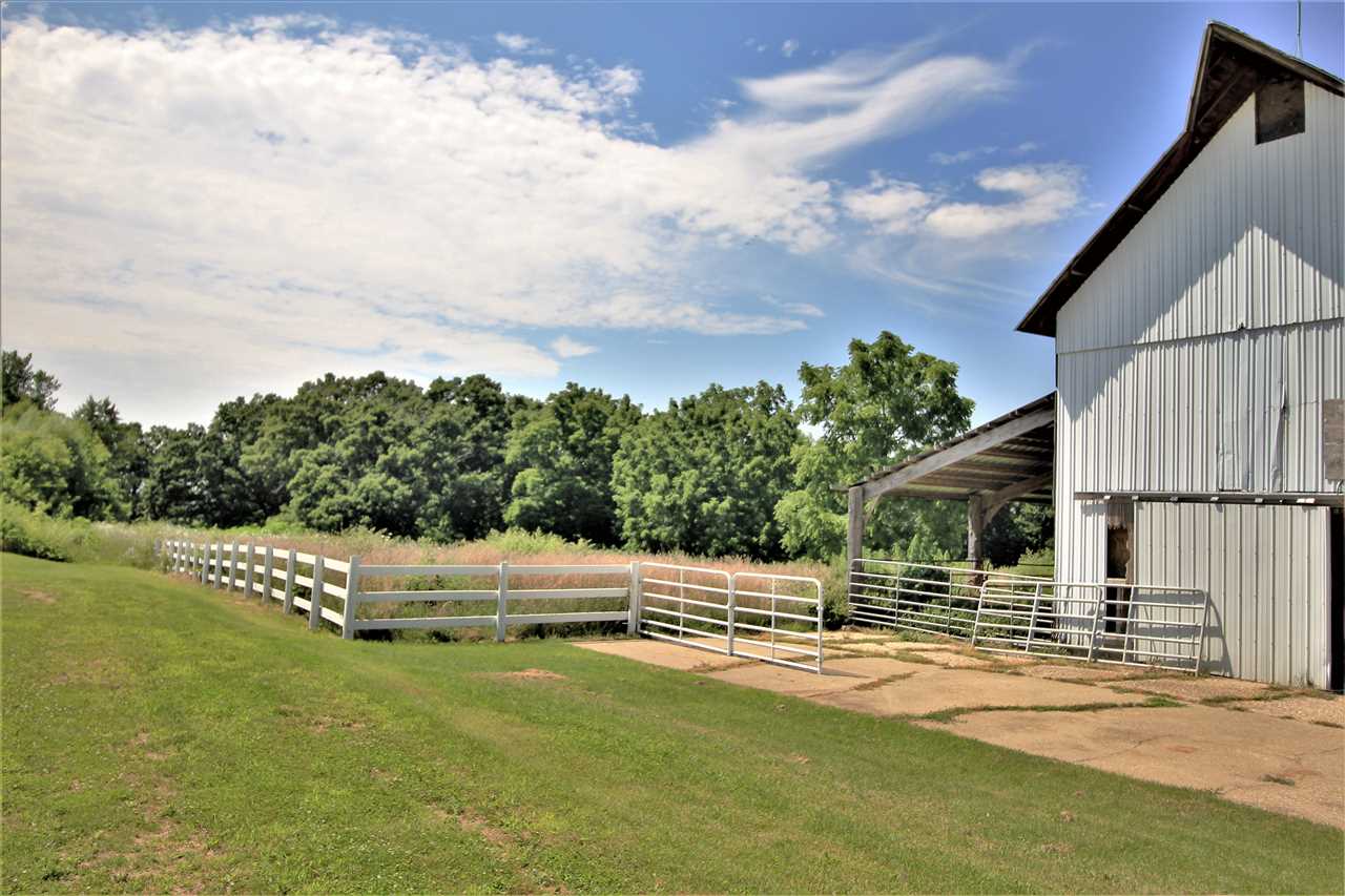 20152 Free Church Road Caledonia, IL 61011 - Photo 25 of 25 a view of a house with a yard