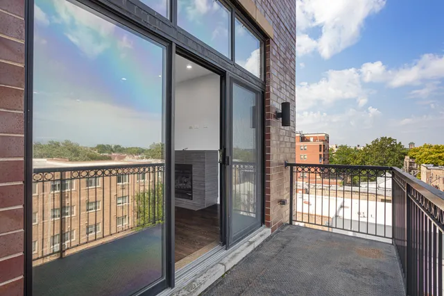 a view of a balcony with city view