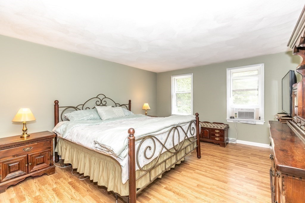 8 Comanche Circle Billerica, MA 01821 - Photo 17 of 35 a bedroom with a bed and a view of bedroom