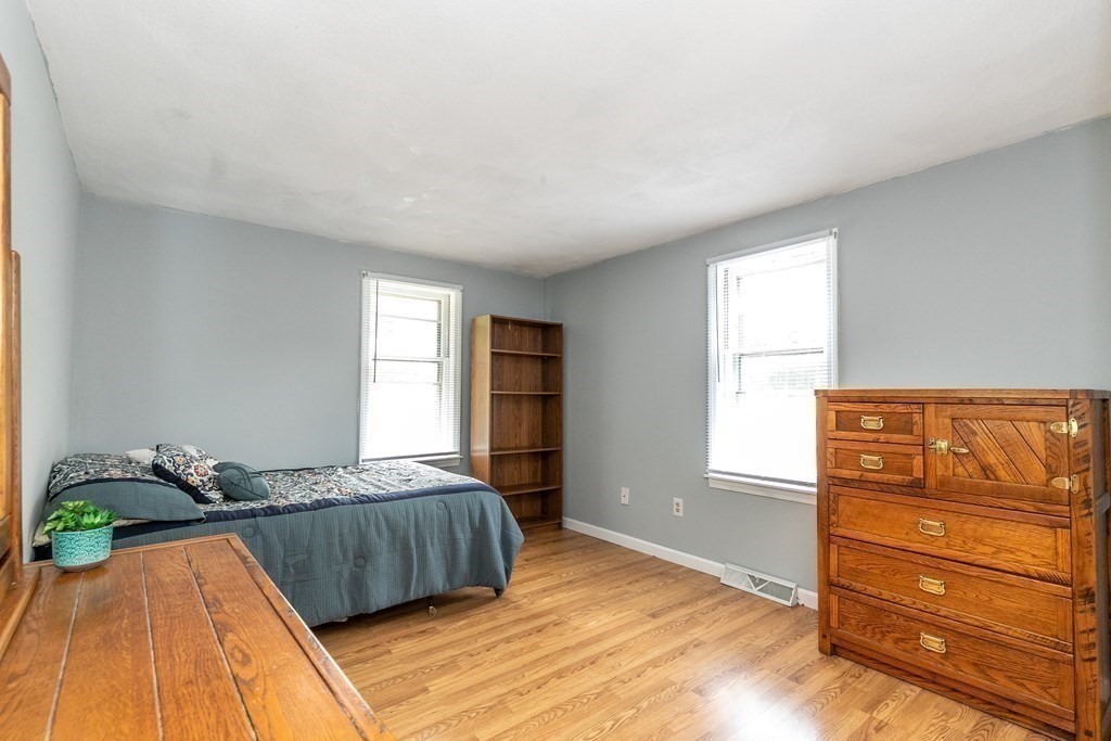 8 Comanche Circle Billerica, MA 01821 - Photo 23 of 35 a bedroom with a bed and a window