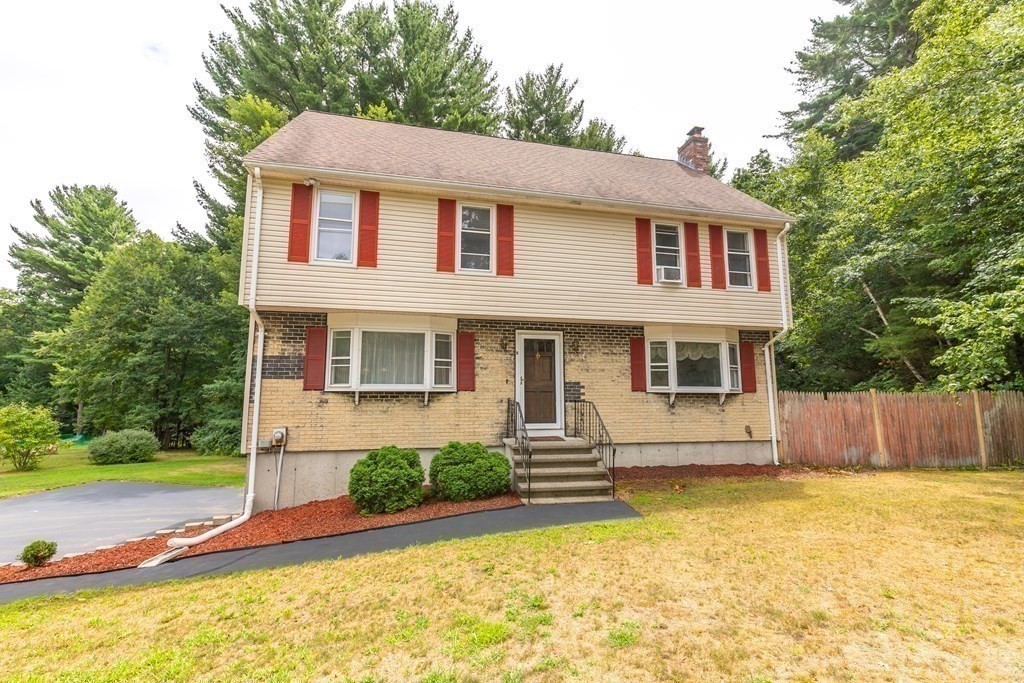 8 Comanche Circle Billerica, MA 01821 - Photo 25 of 35 a front view of a house with swimming pool
