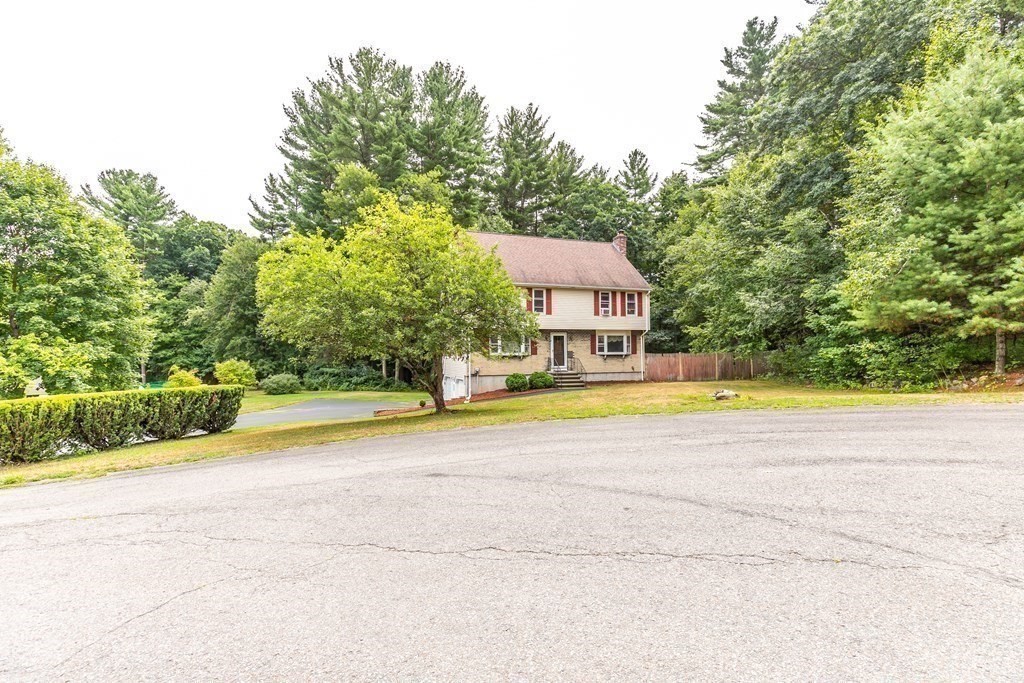 8 Comanche Circle Billerica, MA 01821 - Photo 26 of 35 a view of a swimming pool with an outdoor space and seating area